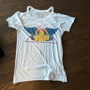 Super cute Aerosmith tee with cuts at neck. (Small stain needs to bleach)